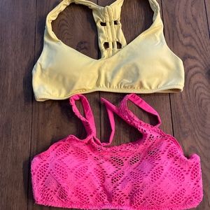 2 Becca swim tops size medium